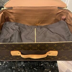Louis Vuitton carry one case with rollers